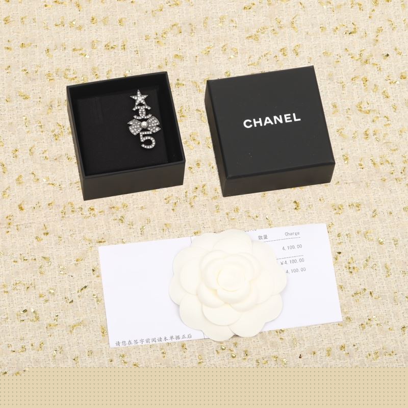 Ch*el brooches